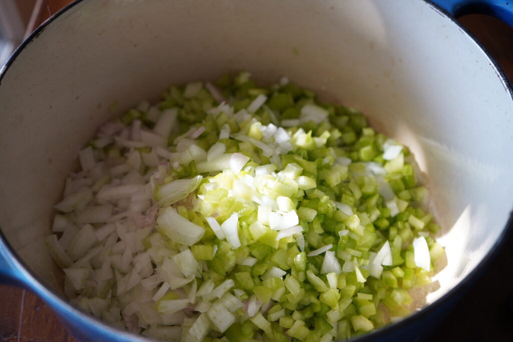 chopped vegetables inside a Dutch oven