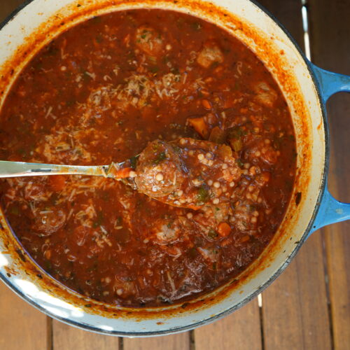 italian meatball soup in a pot