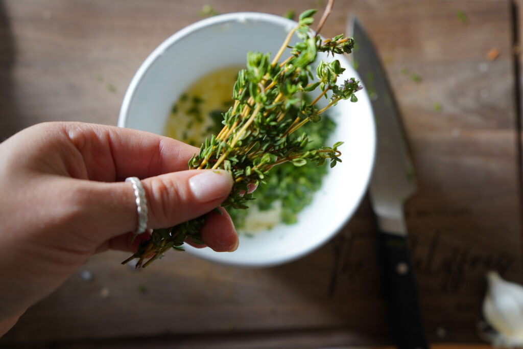 Thyme, ready to be put into the garlic herb butter.