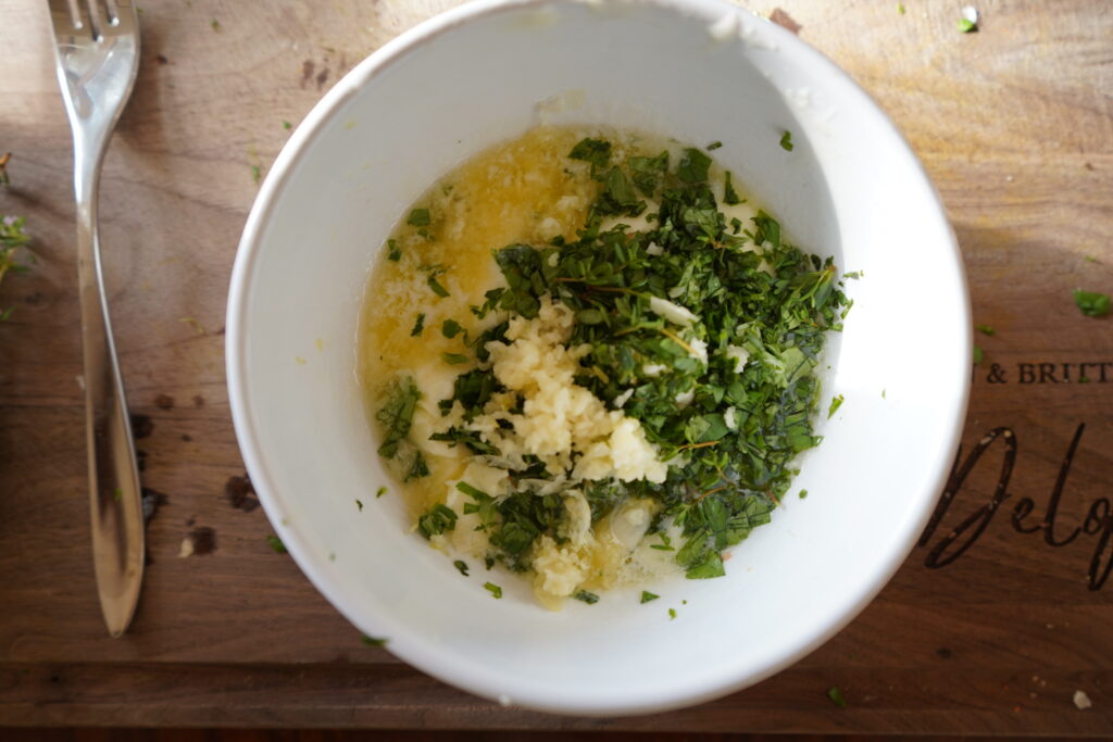 Garlic herb butter, ready to be mixed.