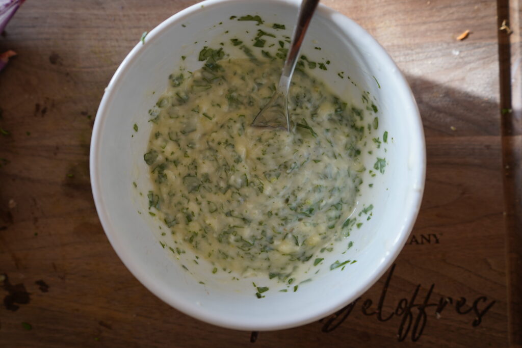 Garlic Herb Butter that is ready to be used.