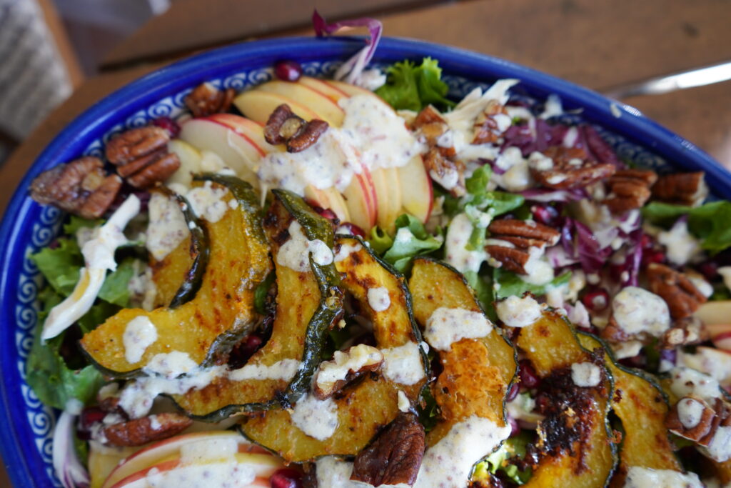 Pecans sprinkled all over a salad.