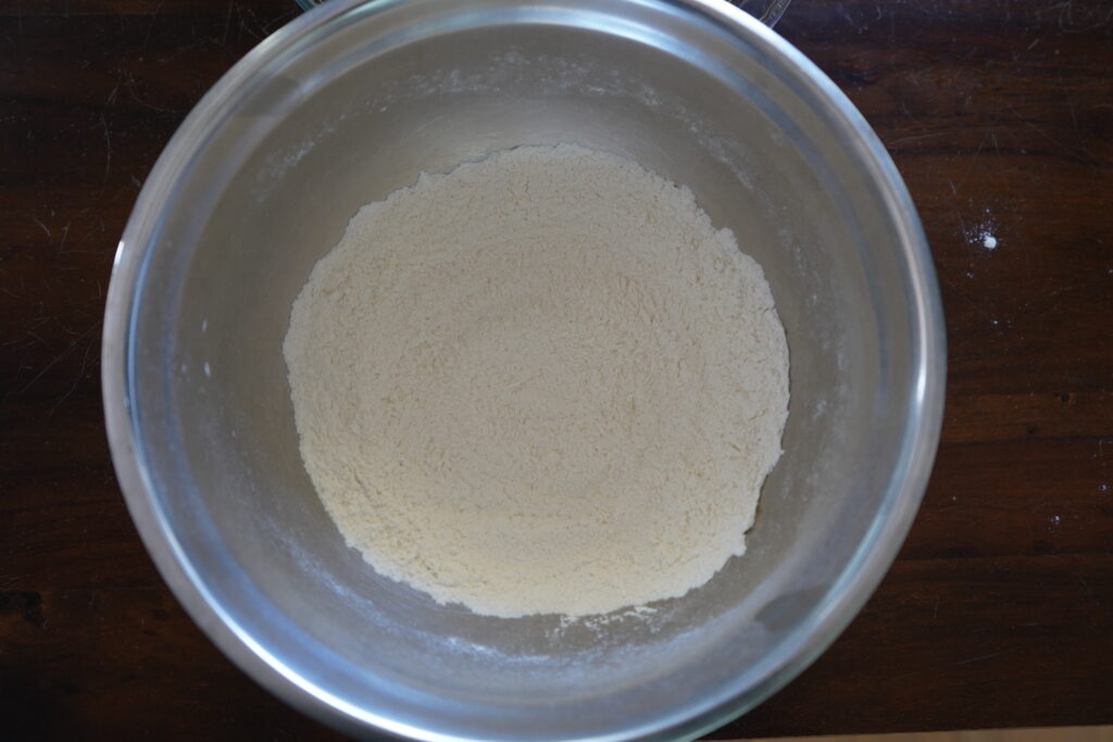 A bowl of flour, baking powder and salt