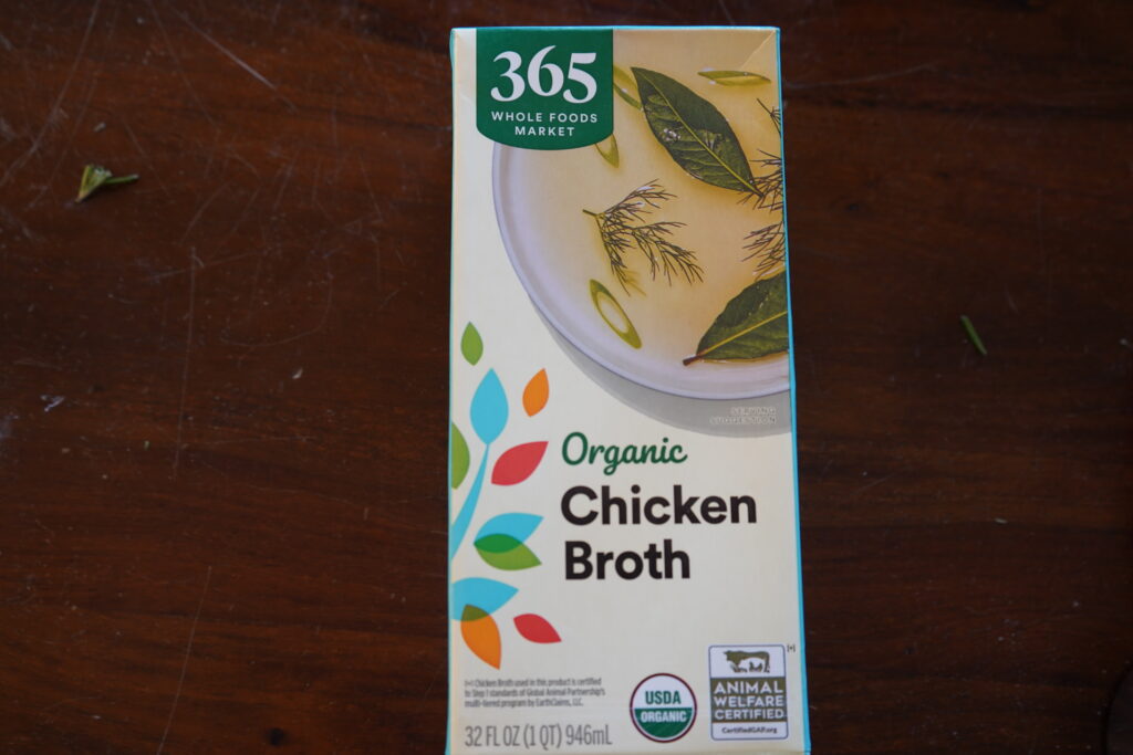 a carton of organic chicken broth