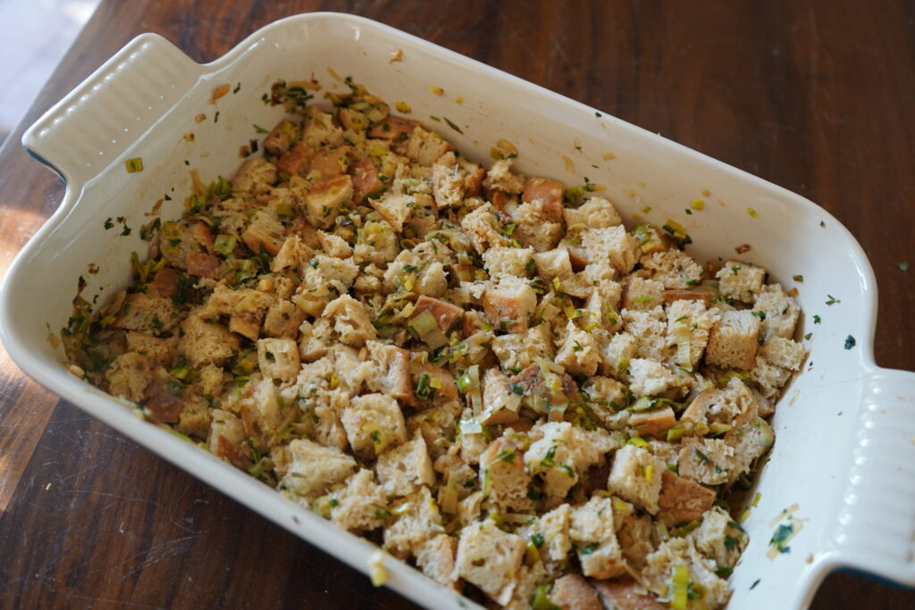 a dish of stuffing that has leeks and onions