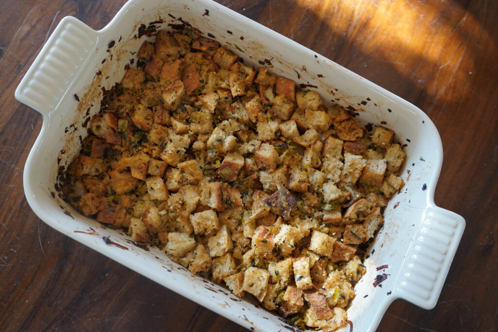 a serving tray full of sourdough stuffing ready for thanksgiving