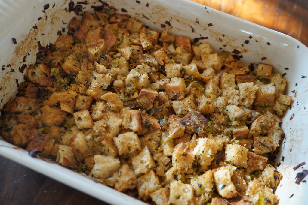 cubed and baked sourdough in a baking dish