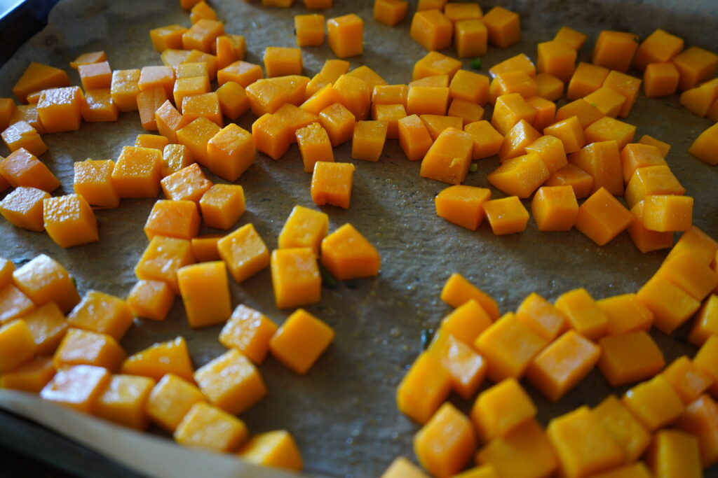 baked butternut squash on a tray