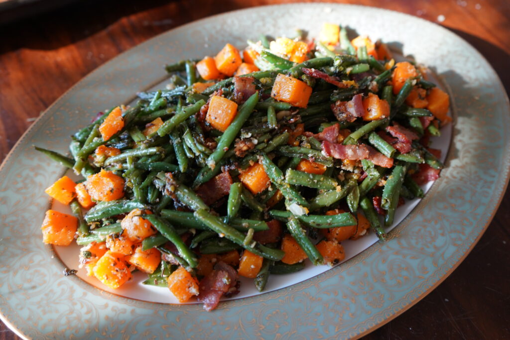 a China serving plate with vegetables layer inside