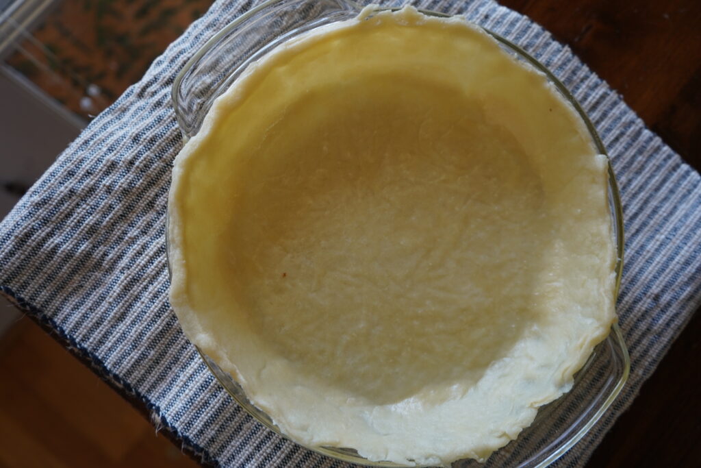 precooked pie crust waiting to be filled 