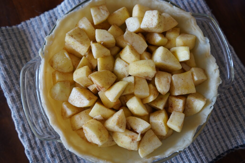 a apple pie being built