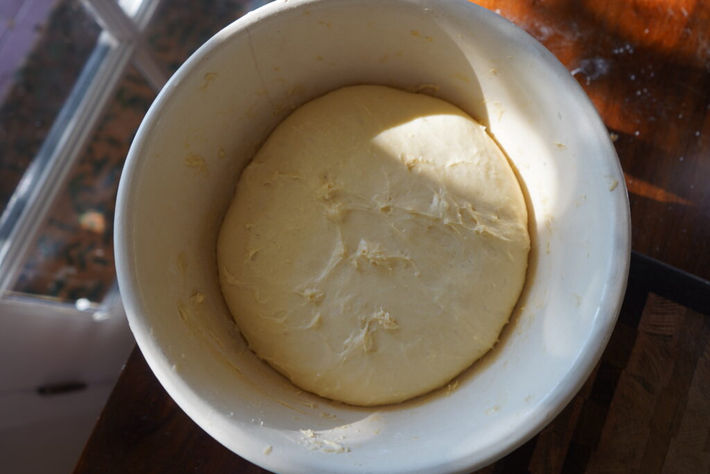 puffed up dough in a bowl