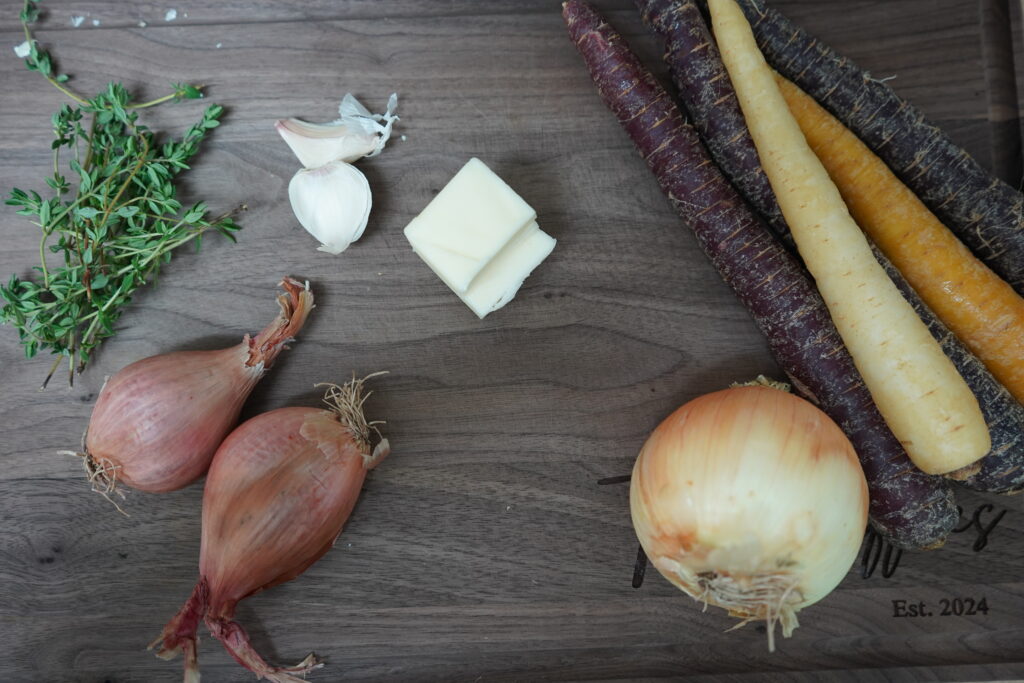 A bunch of vegetables on a cutting board