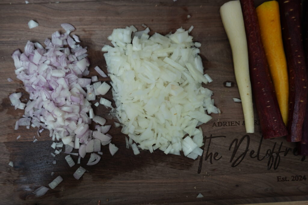 chopped onions and shallots on a cutting board