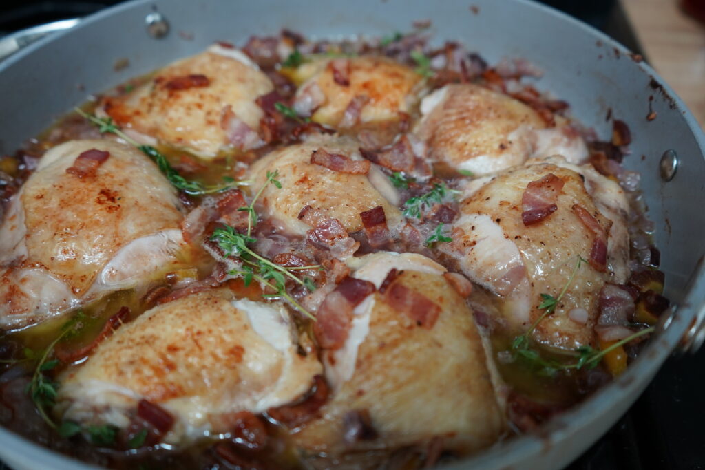 a pan full of a french chicken recipe