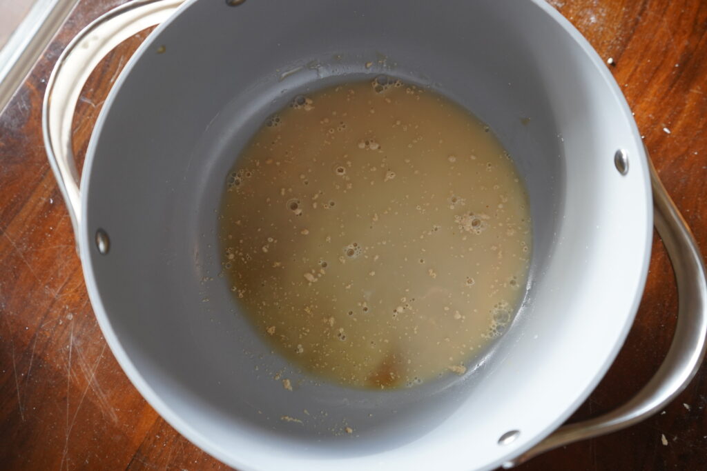 watery yeast in a mixing bowl