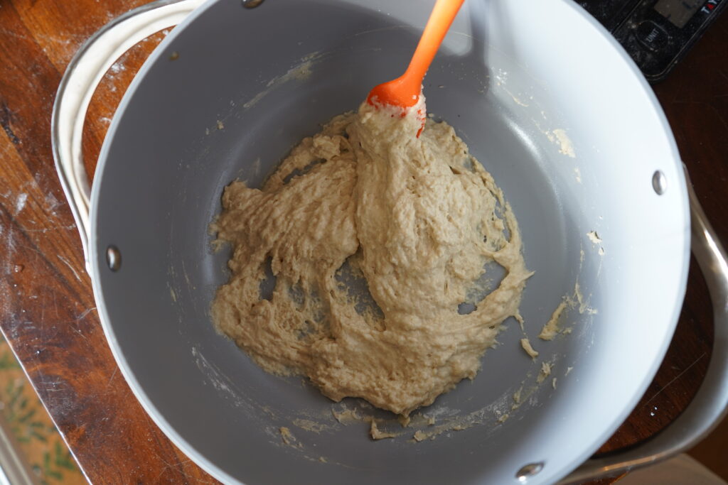 very sticky dough in a mixing bowl