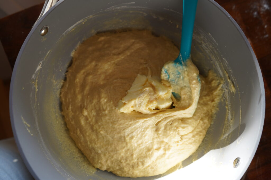 dough with added butter in a bowl