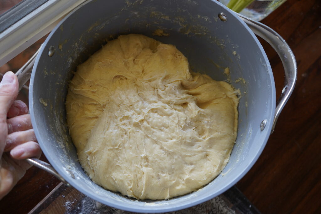 fluffy dough in a mixing bowl