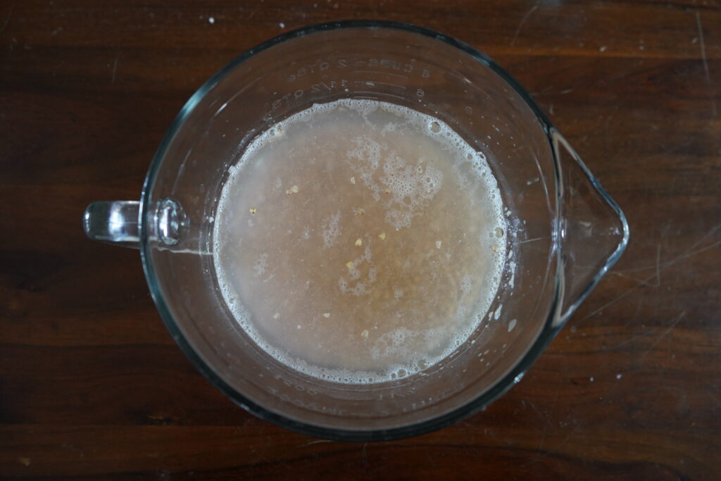 filmy looking water in a glass mixing bowl