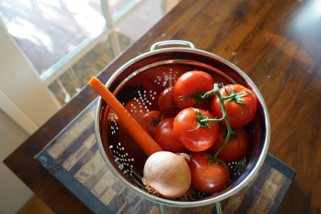 tomatoes in a strainer