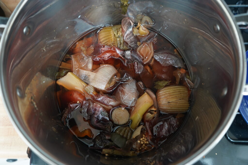 cooked vegetables in a large pot 