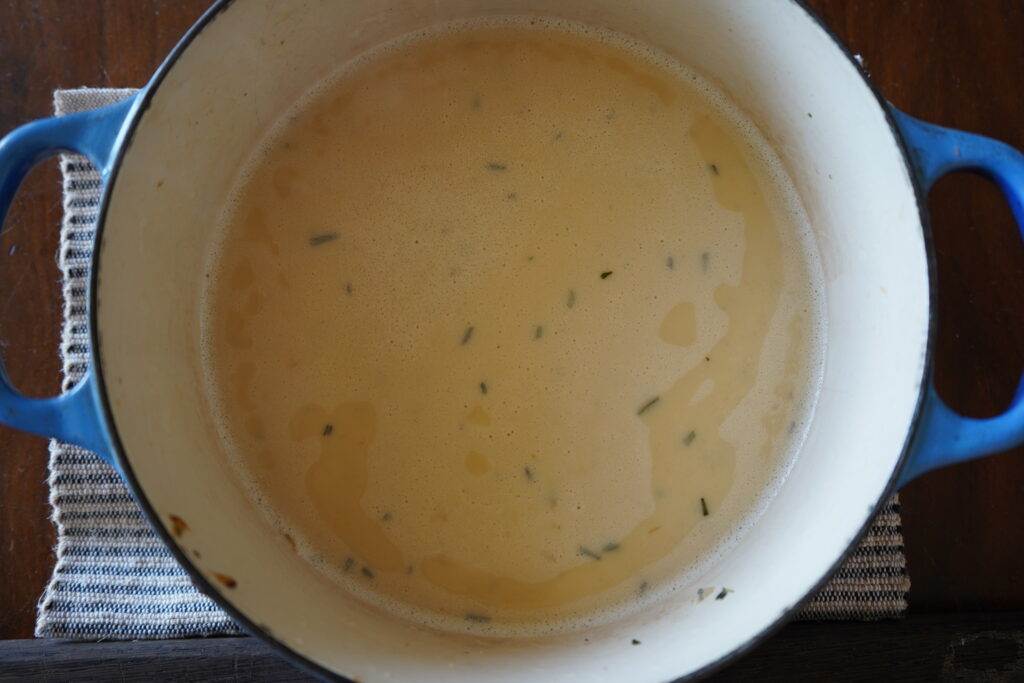 a biege looking garlic soup