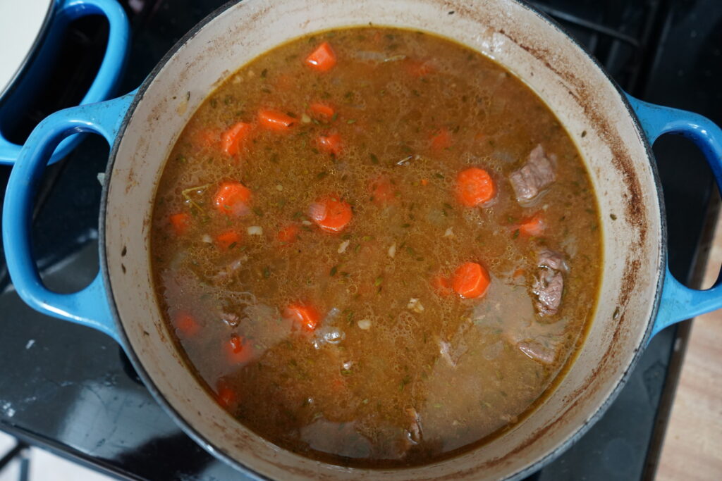 a beef stew on the oven