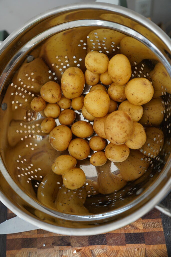 baby golden potatoes in a stariner