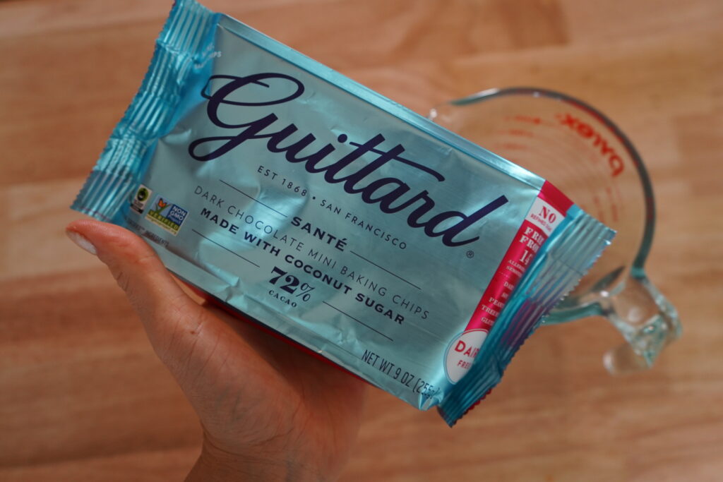 a bag of guittard chocolate in a hand