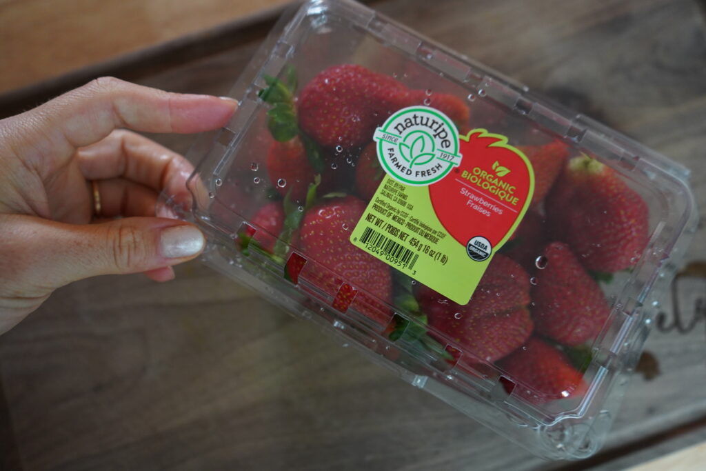 a container of organic strawberries