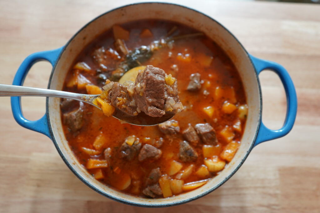 French One-Pot Stew recipe in a blue Dutch oven