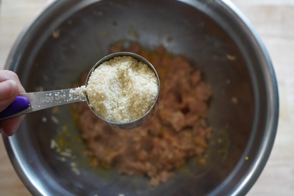 almong flour over a bowl or mixed meat