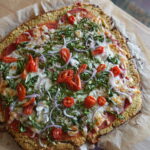 a pizza made with cauliflower pizza crust