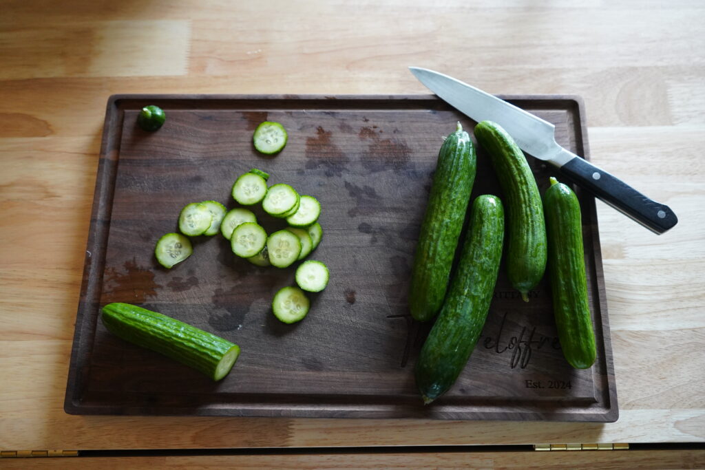 cucumber on a wood cutting board