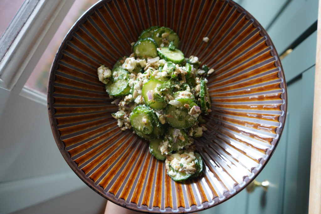 fresh cucumber, feta salad in a fun bowl