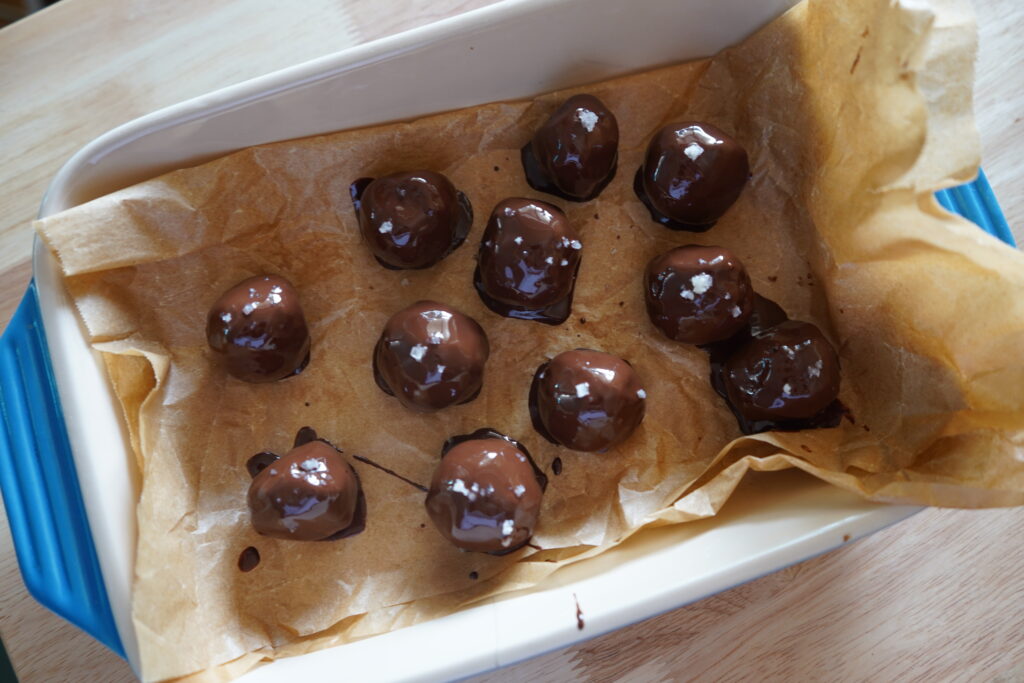 chocolate covered balls made of dates
