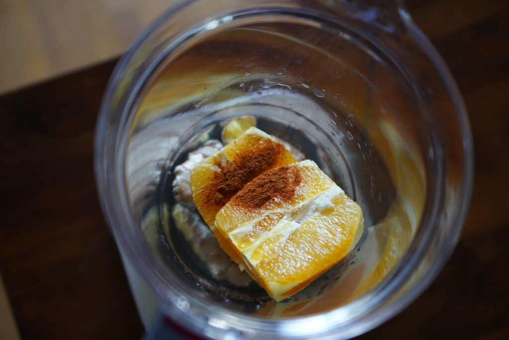 orange, ginger, cayenne pepper in a blender