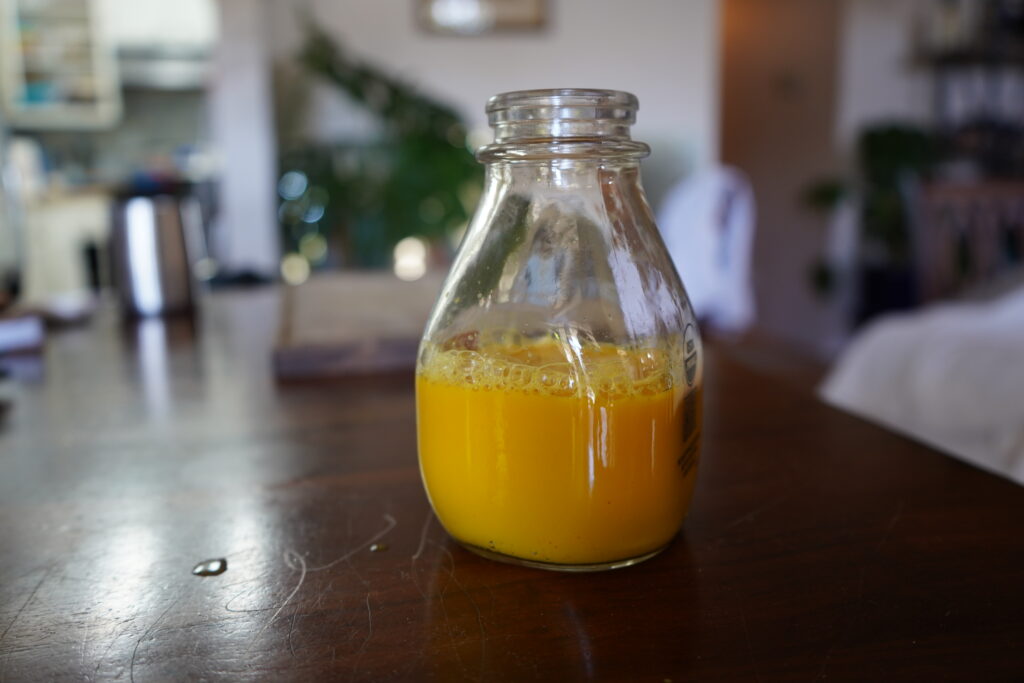 immunity ginger and turmeric shot on a table 