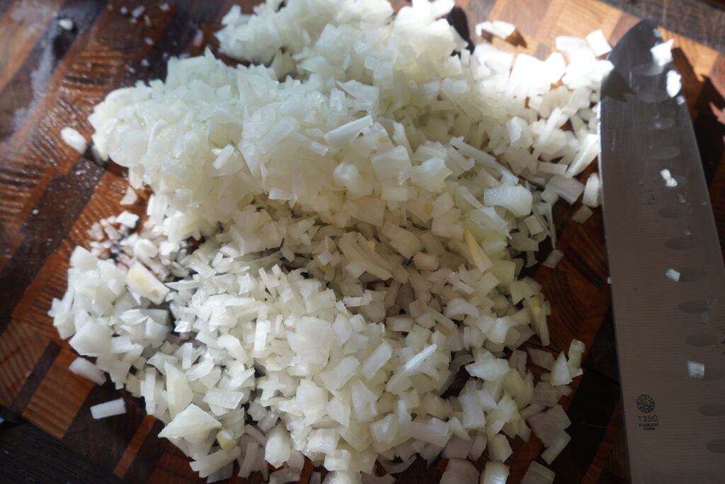 chopped onion on a ctting board