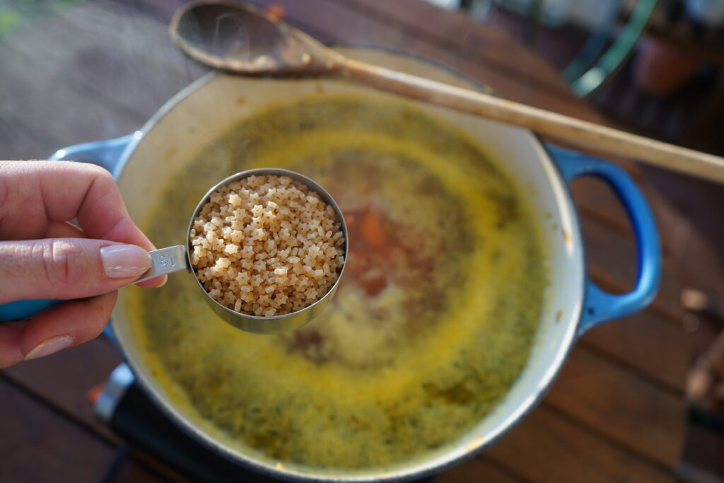 a had 1/3 cup of uncooked noodles over a pot of boiling soup